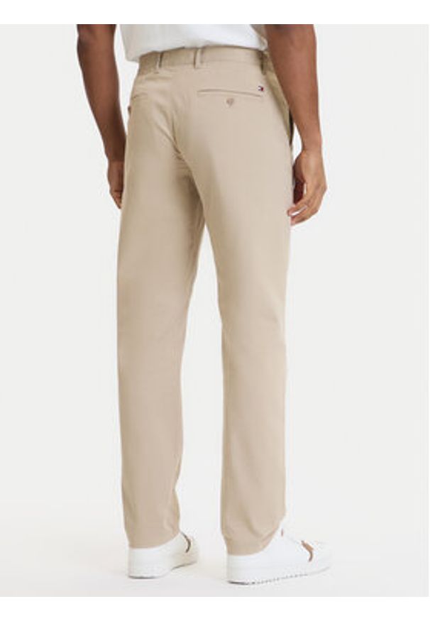 TOMMY HILFIGER - Tommy Hilfiger Chinosy Denton Essential MW0MW40262 Beżowy Straight Fit. Kolor: beżowy. Materiał: bawełna