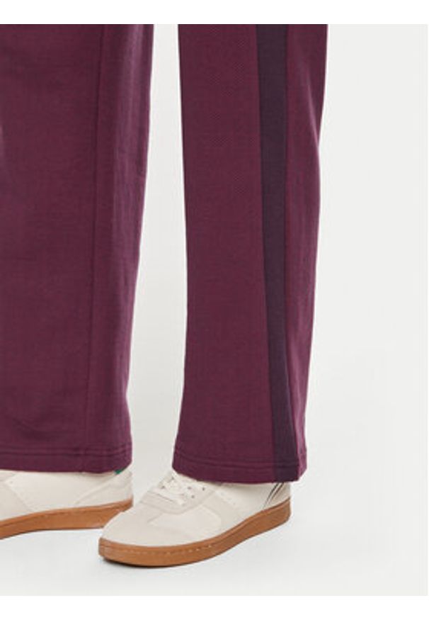 Puma Spodnie dresowe T7 High Waist Track 626798 44 Bordowy Regular Fit. Stan: podwyższony. Kolor: czerwony. Materiał: materiał, bawełna