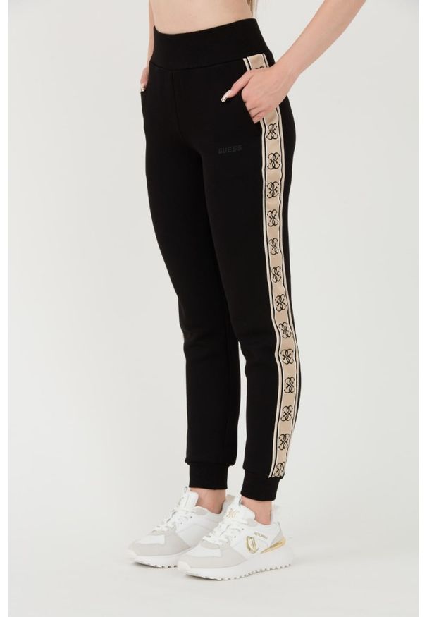 Guess - GUESS Czarne damskie spodnie dresowe Britney Jogger, Rozmiar XL. Kolor: czarny. Materiał: dresówka