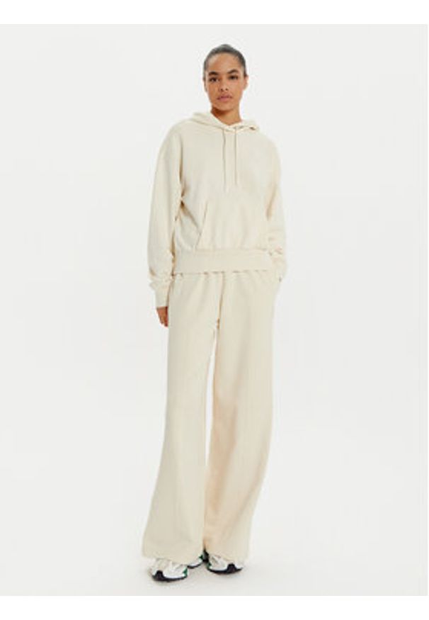 Lacoste Spodnie dresowe XF2657 Écru Wide Leg. Materiał: bawełna