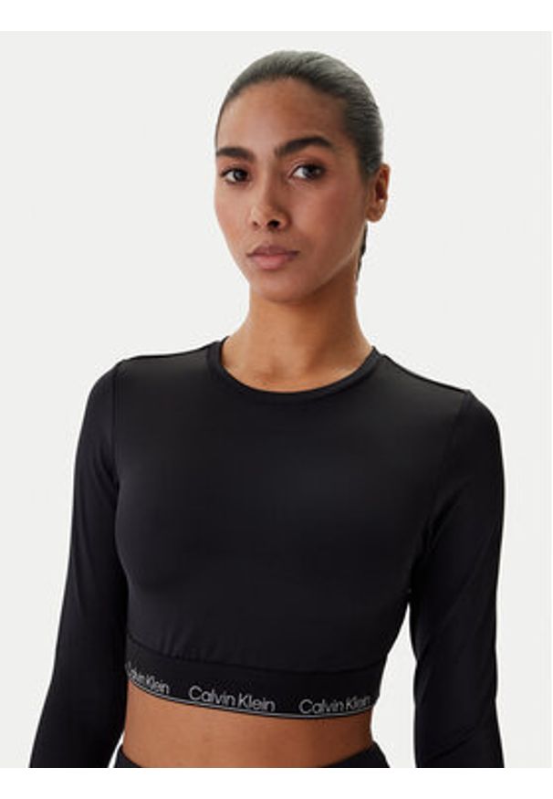 Calvin Klein Swimwear Bluzka LV00Q61128 Czarny Slim Fit. Kolor: czarny. Materiał: syntetyk