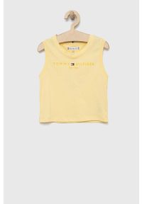 TOMMY HILFIGER - Tommy Hilfiger top bawełniany dziecięcy kolor żółty. Okazja: na co dzień. Kolor: żółty. Materiał: bawełna. Długość rękawa: na ramiączkach. Wzór: nadruk. Styl: casual #1