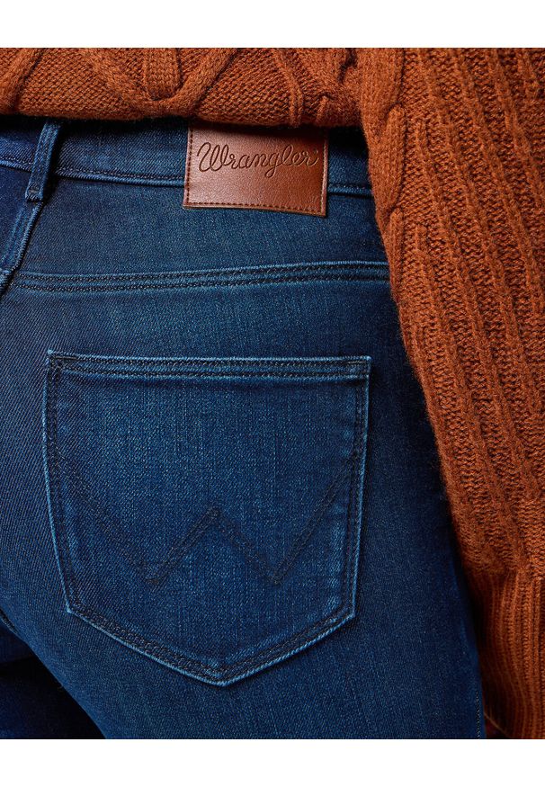 Wrangler - WRANGLER DAMSKIE SPODNIE JEANSOWE HIGH SKINNY SOLSTICE BLUE 112358235 W27H018359