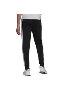 Adidas - Spodnie męskie adidas Primegreen Essentials Warm-Up Tapered 3-Stripes Track. Kolor: biały, czarny, wielokolorowy. Sport: fitness
