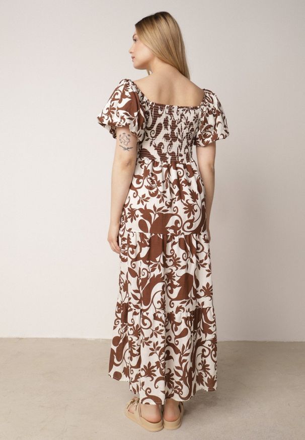 Born2be - Brązowa Rozkloszowana Sukienka z Wiskozy z Bufiastymi Rękawami w Roślinny Wzór Semea. Okazja: na co dzień, do pracy, na spotkanie biznesowe. Kolor: brązowy. Materiał: wiskoza. Sezon: lato. Typ sukienki: rozkloszowane, proste. Styl: casual, biznesowy. Długość: maxi