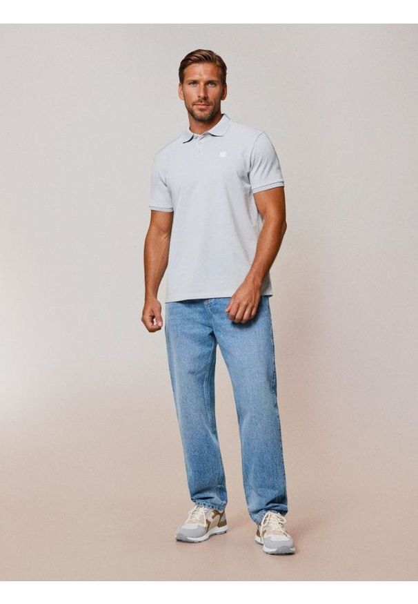 Sinsay - Bawełniane polo z haftem - zielony. Typ kołnierza: polo. Kolor: zielony. Materiał: bawełna. Wzór: haft