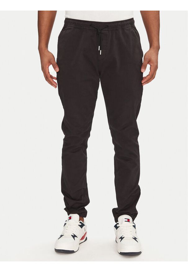 Tommy Jeans Joggery Austin DM0DM20283 Czarny Slim Fit. Kolor: czarny. Materiał: bawełna