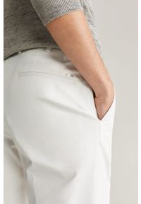 Mango Man - Spodnie Dublin. Kolor: biały. Materiał: tkanina, bawełna, materiał, elastan. Wzór: gładki #3
