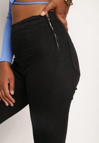 Renee - Czarne Spodnie Skinny Nalena. Stan: podwyższony. Kolor: czarny. Wzór: motyw zwierzęcy, nadruk