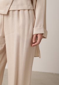 Born2be - Beżowe Wiskozowe Spodnie z Szeroką Nogawką i Wiązaniem w Talii Terisanna. Okazja: na co dzień. Kolor: beżowy. Materiał: wiskoza. Styl: casual, elegancki, klasyczny #8