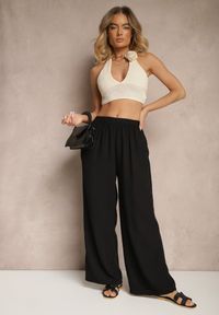 Renee - Czarne Spodnie Palazzo o Szerokim Kroju High Waist Ollevia. Okazja: na spotkanie biznesowe, na co dzień. Stan: podwyższony. Kolor: czarny. Materiał: jedwab. Wzór: aplikacja. Styl: biznesowy, elegancki, casual