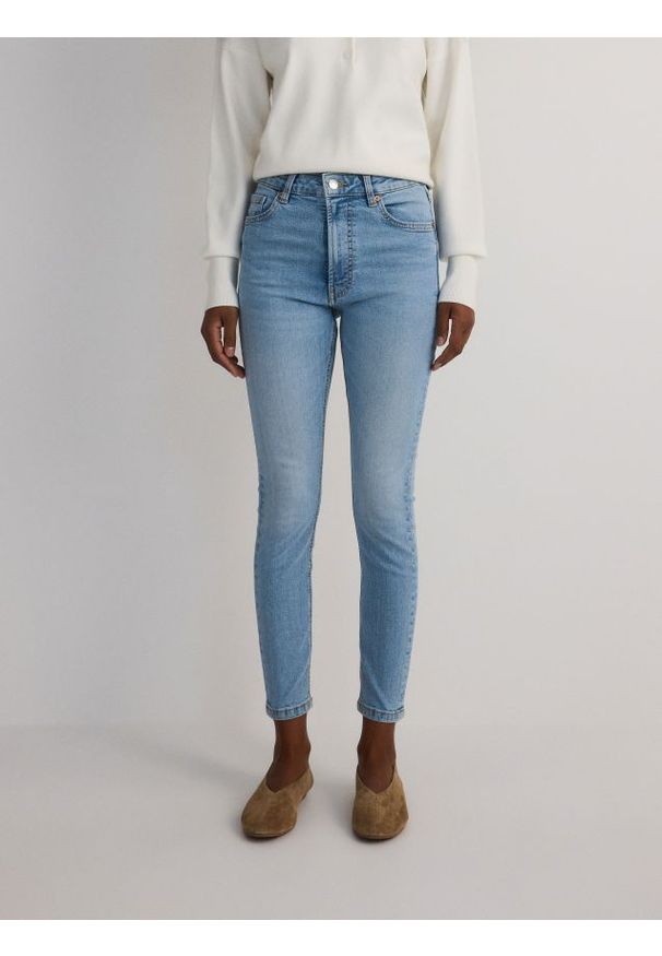 Reserved - Jeansy slim fit mid rise - niebieski. Kolor: niebieski