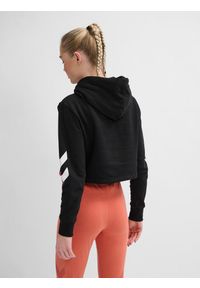 Damska bluza z kapturem Hummel hmlLEGACY cropped. Typ kołnierza: kaptur. Kolor: czarny. Materiał: bawełna, tkanina, materiał. Wzór: nadruk. Sport: fitness