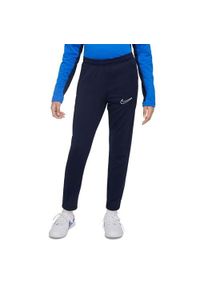 Spodnie sportowe chłopięce Nike Junior Dri-fit Academy 23. Kolor: niebieski, wielokolorowy. Materiał: dresówka. Technologia: Dri-Fit (Nike) #1