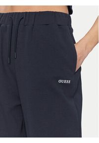 Guess Spodnie dresowe V5GB03 KCS01 Granatowy Regular Fit. Kolor: niebieski. Materiał: bawełna #3