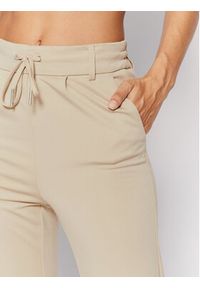 only - ONLY Spodnie materiałowe Poptrash 15115847 Beżowy Slim Fit. Kolor: beżowy. Materiał: wiskoza