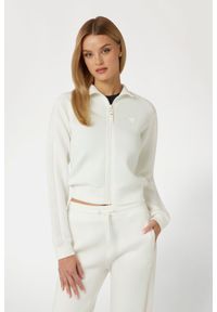 Guess - GUESS Biała bluza damska z lampasami New Allie Scuba. Kolor: biały. Materiał: materiał
