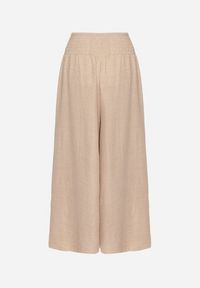 Born2be - Beżowe Spodnie Szerokie z Szeroką Gumką w Talii Koririelle. Okazja: na co dzień. Kolor: beżowy. Styl: elegancki, casual #4