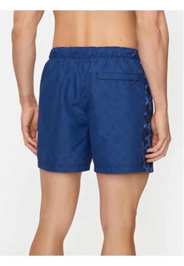 TOMMY HILFIGER - Tommy Hilfiger Szorty kąpielowe UM0UM03211 Granatowy Slim Fit. Kolor: niebieski. Materiał: syntetyk
