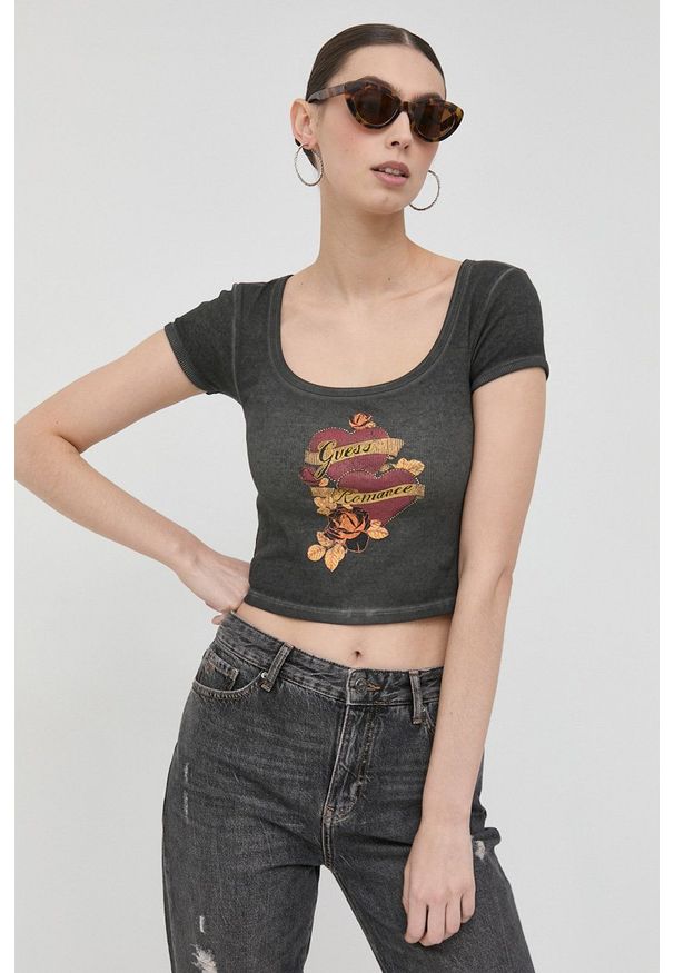 Guess t-shirt damski kolor szary. Kolor: szary. Materiał: materiał, dzianina, prążkowany. Długość rękawa: krótki rękaw. Długość: krótkie. Wzór: nadruk