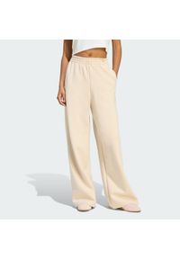Adidas - Spodnie Soft Lux Straight Leg. Kolor: biały. Materiał: materiał. Sport: fitness #1