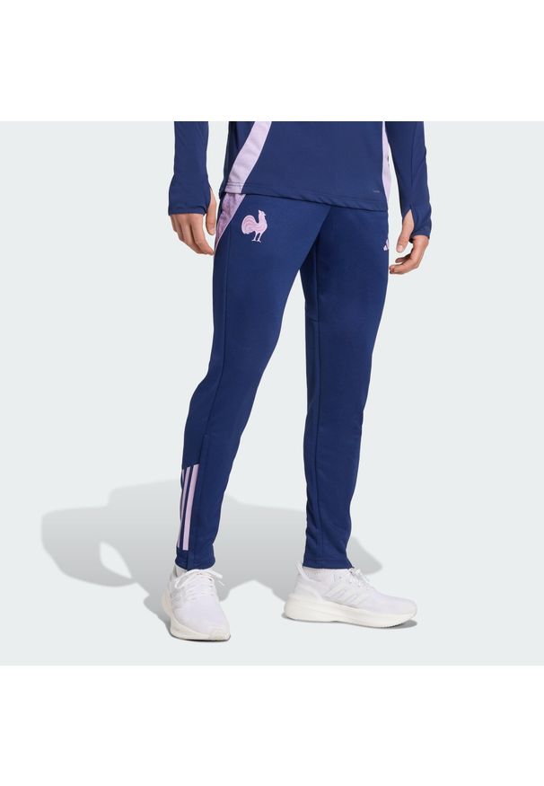 Adidas - Spodnie France Training. Kolor: niebieski. Sport: piłka nożna