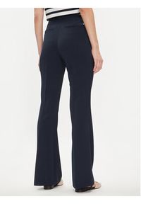 TOMMY HILFIGER - Tommy Hilfiger Spodnie materiałowe Gold Button WW0WW42455 Granatowy Flare Fit. Kolor: niebieski. Materiał: syntetyk #2