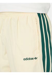 Adidas - adidas Spodnie dresowe Cutline Track Tracksuit Bottoms KW8021 Kremowy Regular Fit. Kolor: kremowy. Materiał: syntetyk #2