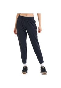 Spodnie sportowe damskie Under Armour Unstoppable Jogger. Kolor: czarny. Materiał: dresówka. Sport: bieganie