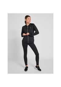 Damskie pełne legginsy Hummel q4 Hw. Kolor: czarny. Materiał: materiał. Wzór: jodełka, nadruk. Sport: fitness
