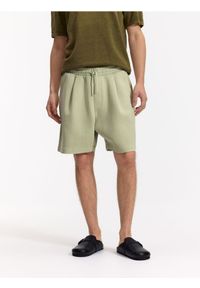 Reserved - Szorty comfort fit - oliwkowy. Kolor: oliwkowy. Materiał: dzianina, bawełna