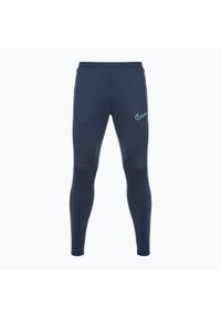 Spodnie piłkarskie męskie Nike Dri-Fit Academy. Kolor: niebieski. Materiał: dresówka. Technologia: Dri-Fit (Nike). Sport: piłka nożna