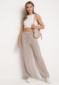 Born2be - Szare Spodnie Szerokie z Gumką w Pasie z Ozdobnym Łańcuszkiem Istaria. Okazja: na co dzień. Kolor: szary. Styl: casual