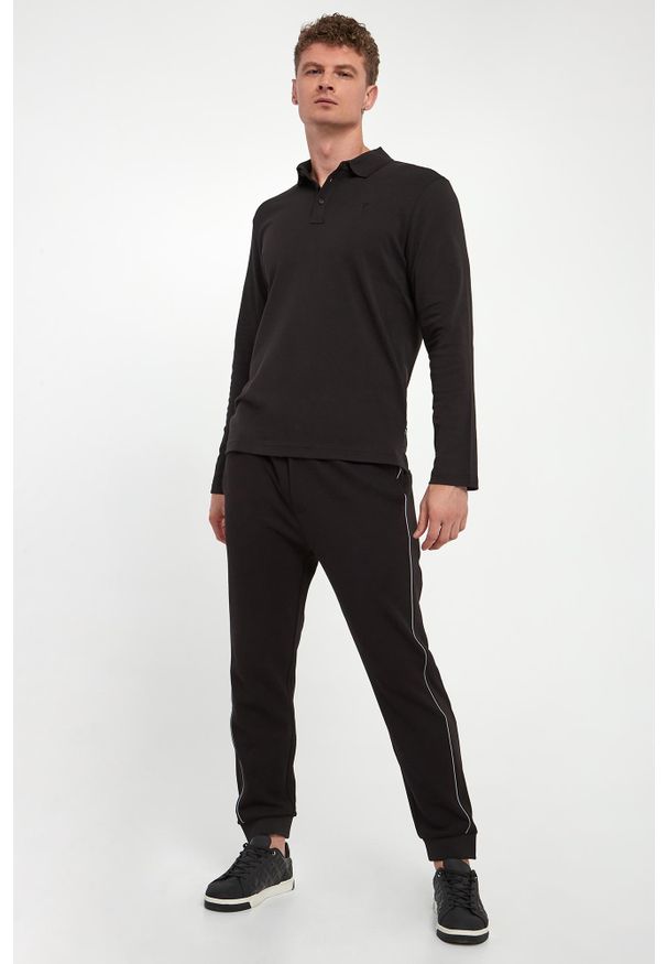 Spodnie dresowe męskie Tjanko JOOP!. Materiał: dresówka