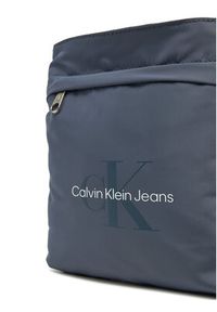 Calvin Klein Jeans Saszetka Sport Essentials Flatpack 18 LV04G3030G Granatowy. Kolor: niebieski. Materiał: materiał #4