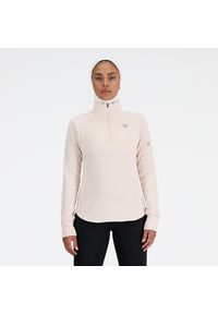 Bluza damska New Balance WT23252QPH – różowa. Kolor: różowy. Materiał: materiał, poliester, dresówka, tkanina, skóra. Długość: długie. Sezon: zima. Sport: fitness