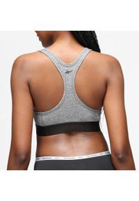 Stanik fitness Reebok. Materiał: materiał, elastan. Sport: fitness