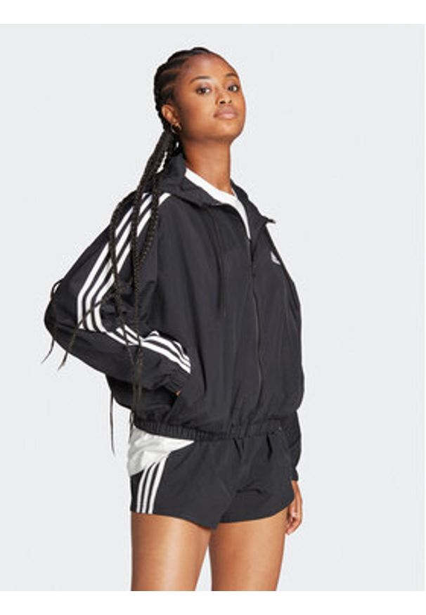 Adidas - adidas Wiatrówka Essentials 3-Stripes Woven Windbreaker HT3399 Czarny Loose Fit. Kolor: czarny. Materiał: syntetyk