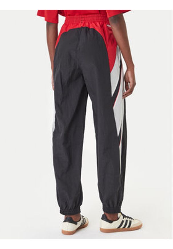 Adidas - adidas Spodnie dresowe Sport Santiago KC9116 Czarny Loose Fit. Kolor: czarny. Materiał: syntetyk