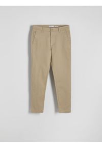 Reserved - Spodnie chino slim fit - beżowy. Kolor: beżowy. Materiał: tkanina, bawełna