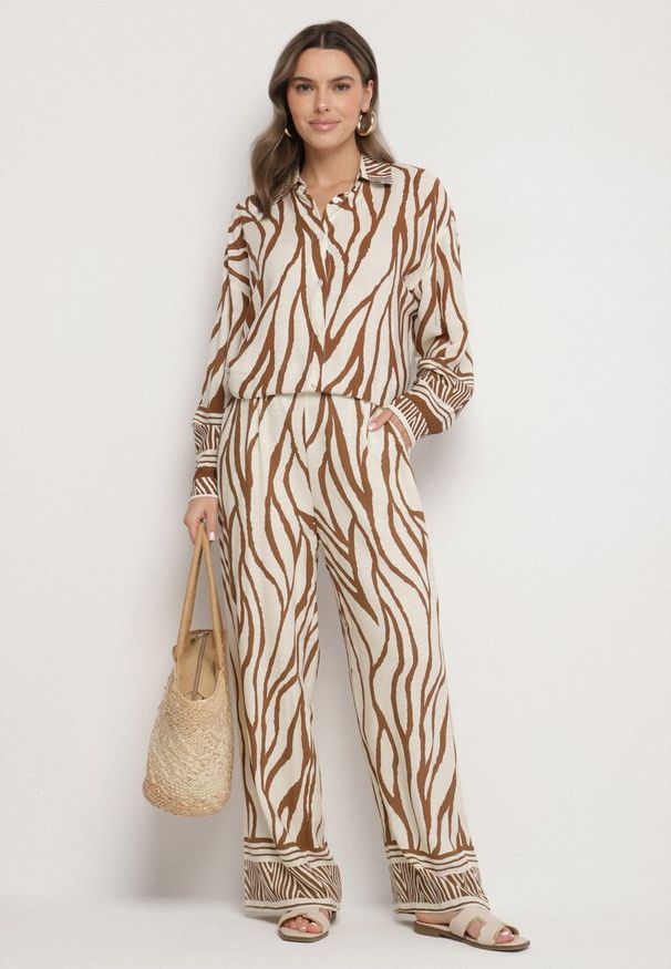 Born2be - Brązowe Wiskozowe Spodnie z Lnem o Szerokim Kroju z Wysokim Stanem w Zebrę Fenelina. Okazja: na co dzień. Stan: podwyższony. Kolor: brązowy. Materiał: len, wiskoza. Wzór: motyw zwierzęcy. Styl: casual, elegancki