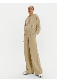 Lacoste Spodnie dresowe XF2657 Beżowy Wide Leg. Kolor: beżowy. Materiał: bawełna #4