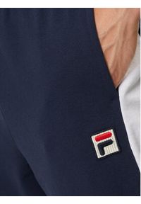 Fila Spodnie dresowe FAM0612 Granatowy Regular Fit. Kolor: niebieski. Materiał: bawełna