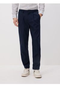 Reserved - Spodnie chino slim z lnem - granatowy. Kolor: niebieski. Materiał: len
