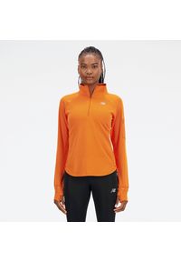 Bluza damska New Balance WT23252CEN – pomarańczowa. Kolor: pomarańczowy. Materiał: dresówka, polar, poliester, materiał, skóra, tkanina. Długość: długie. Sezon: zima. Styl: sportowy. Sport: fitness