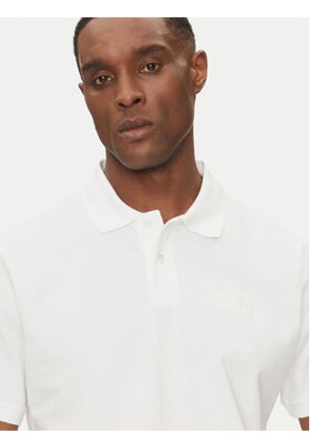 The North Face Polo Essential NF0A8C1P Biały Regular Fit. Typ kołnierza: polo. Kolor: biały. Materiał: bawełna