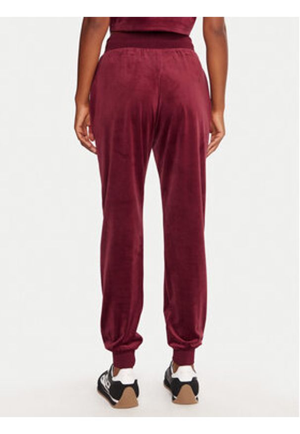 Guess Spodnie dresowe V3BB27 K0232 Bordowy Regular Fit. Kolor: czerwony. Materiał: syntetyk