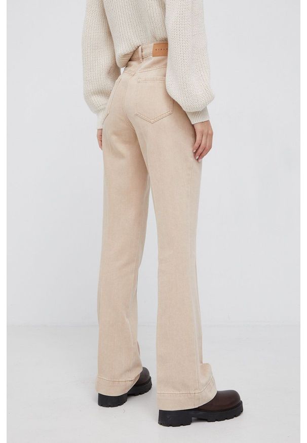 Sisley Jeansy bawełniane damskie high waist. Stan: podwyższony. Kolor: beżowy