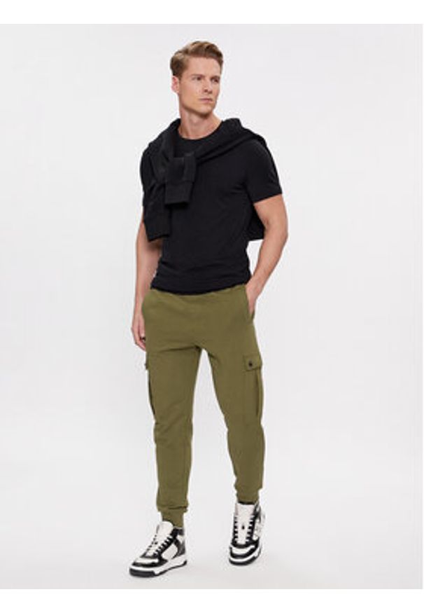 BOSS - Boss Spodnie dresowe Seteam 50507886 Zielony Relaxed Fit. Kolor: zielony. Materiał: bawełna