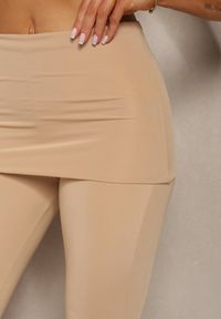 Renee - Beżowe Elastyczne Spodnie o Kroju Dzwonów High Waist z Modelującego Materiału Ivolea. Stan: podwyższony. Kolor: beżowy. Materiał: materiał